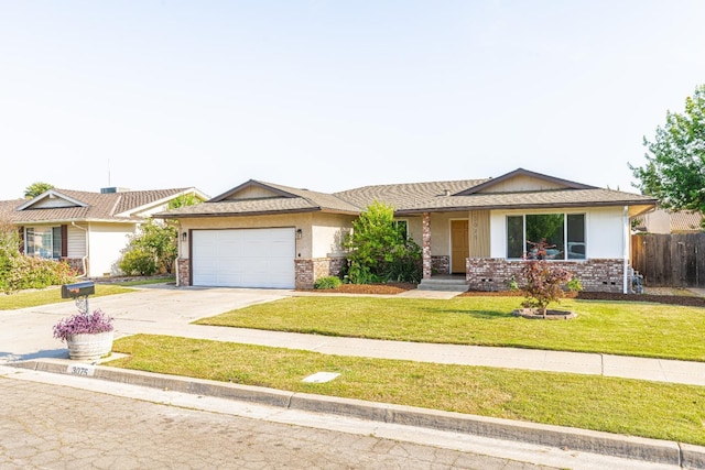 ranch-style house with fence, a front yard, brick siding, concrete driveway, and an attached garage