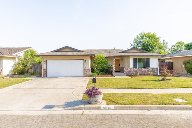 ranch-style home with a garage, concrete driveway, a front yard, and brick siding