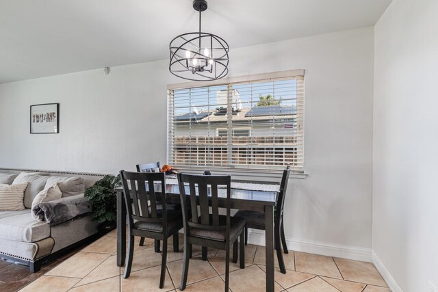 927 W Pico, Clovis, CA 93612 - dining room with tile patterned floors, a notable chandelier, and baseboards