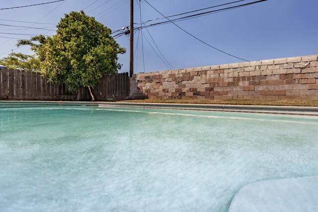 927 W Pico, Clovis, CA 93612 - view of pool with a fenced in pool and fence