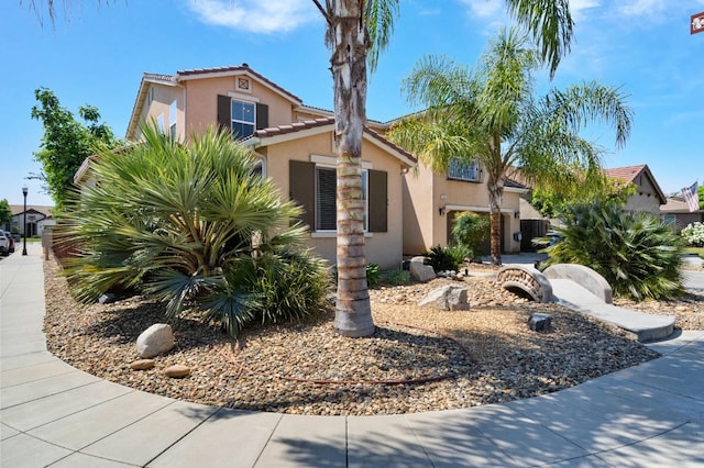 3772 Wrenwood Ave, Clovis, CA 93619 - mediterranean / spanish-style home featuring a tiled roof and stucco siding