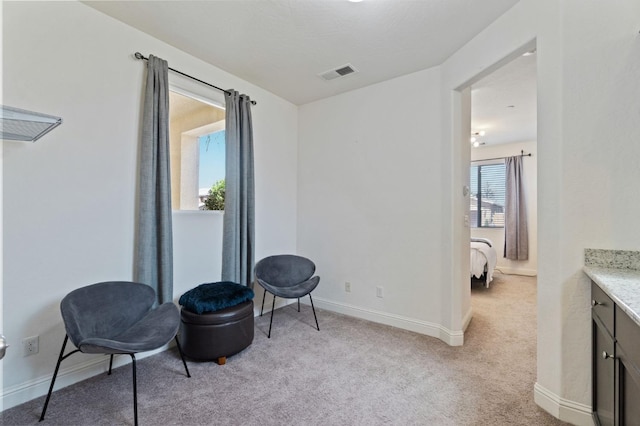 3772 Wrenwood Ave, Clovis, CA 93619 - living area featuring baseboards, visible vents, and light colored carpet