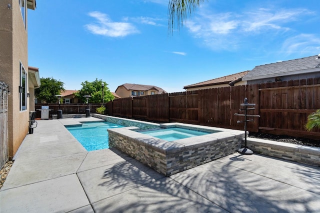 3772 Wrenwood Ave, Clovis, CA 93619 - view of swimming pool with a fenced backyard, a patio area, and a pool with connected hot tub