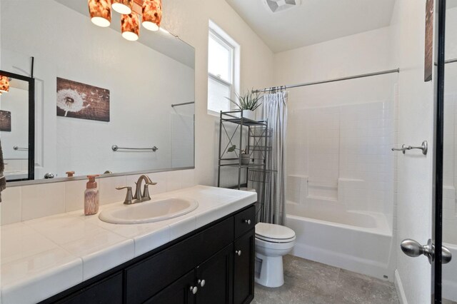 full bathroom featuring toilet, visible vents, shower / bath combination with curtain, and vanity