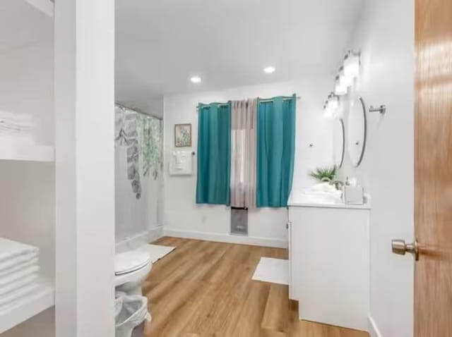 56406 Marina View Way, Bass Lake, CA 93604 - bathroom featuring vanity, toilet, recessed lighting, curtained shower, and wood finished floors