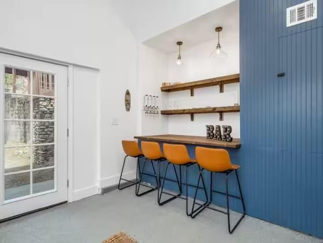 56406 Marina View Way, Bass Lake, CA 93604 - bar with visible vents, baseboards, concrete flooring, and a bar