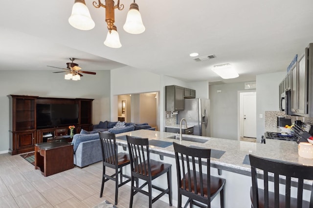 dining area featuring visible vents and a ceiling fan