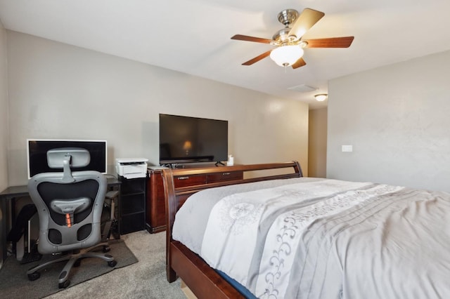bedroom featuring a ceiling fan and light colored carpet