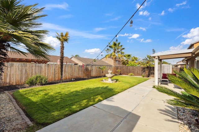 view of yard featuring a patio and a fenced backyard