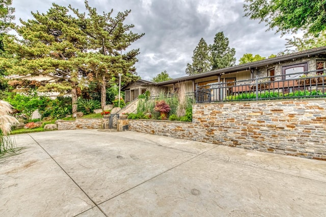 1409 W Big Sandy Rd, Fresno, CA 93711 - view of front of house featuring a patio