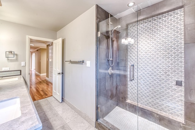 1409 W Big Sandy Rd, Fresno, CA 93711 - full bath featuring baseboards, a sink, tile patterned flooring, and a stall shower
