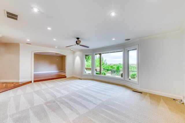 1409 W Big Sandy Rd, Fresno, CA 93711 - spare room with crown molding, carpet floors, ceiling fan, and visible vents