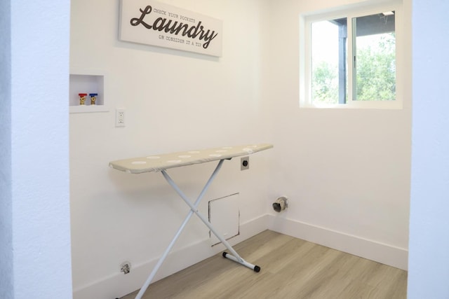 17231 E Trimmer Springs Rd, Sanger, CA 93657 - laundry room featuring hookup for a washing machine, light wood-style floors, electric dryer hookup, and baseboards
