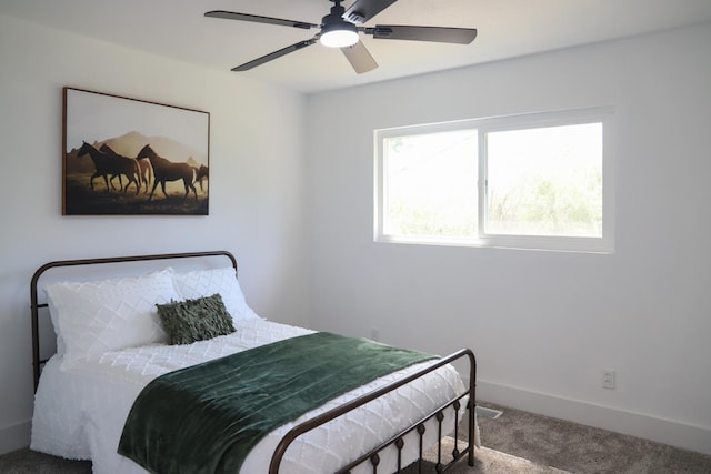 bedroom with carpet floors, baseboards, and ceiling fan