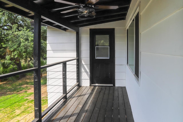 wooden terrace with ceiling fan