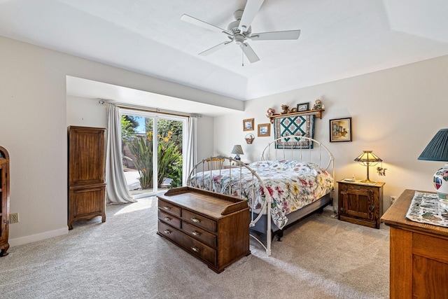 bedroom featuring baseboards, a ceiling fan, access to exterior, and light colored carpet