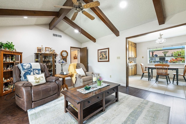 living area featuring a ceiling fan, recessed lighting, wood finished floors, and visible vents