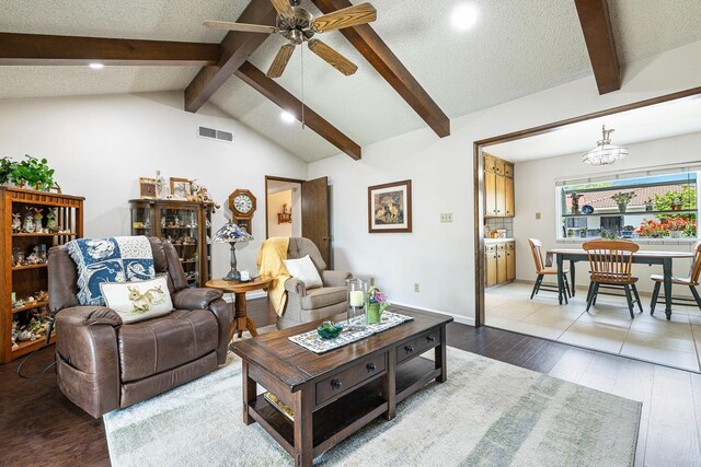 943 E Goshen Ave, Fresno, CA 93720 - living area featuring wood finished floors, ceiling fan, and recessed lighting