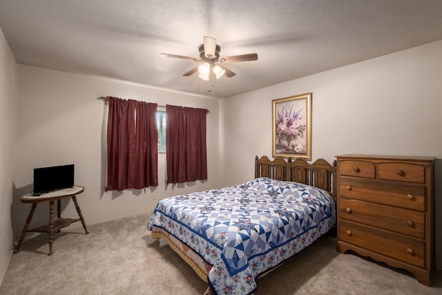 6352 N Fisher St, Fresno, CA 93710 - bedroom featuring light carpet and a ceiling fan