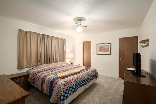 6352 N Fisher St, Fresno, CA 93710 - bedroom featuring dark carpet and ceiling fan