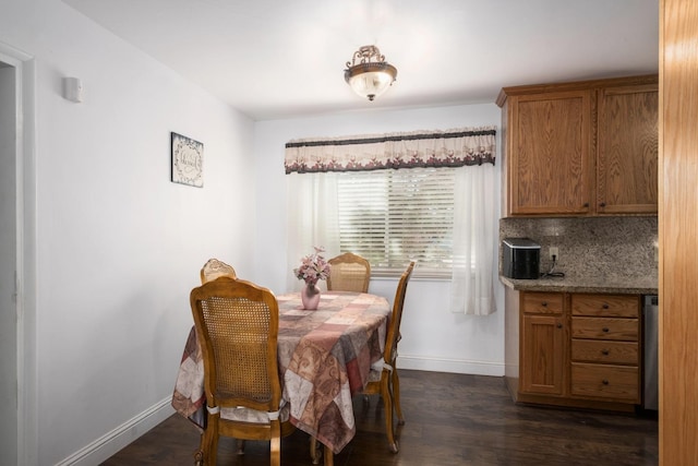 6352 N Fisher St, Fresno, CA 93710 - dining room featuring baseboards and dark wood-style flooring