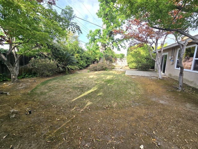 view of yard with fence