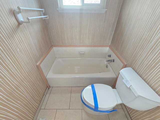 full bathroom featuring tile patterned floors and toilet