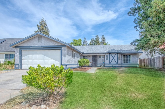 ranch-style house featuring fence, driveway, a front yard, and stucco siding