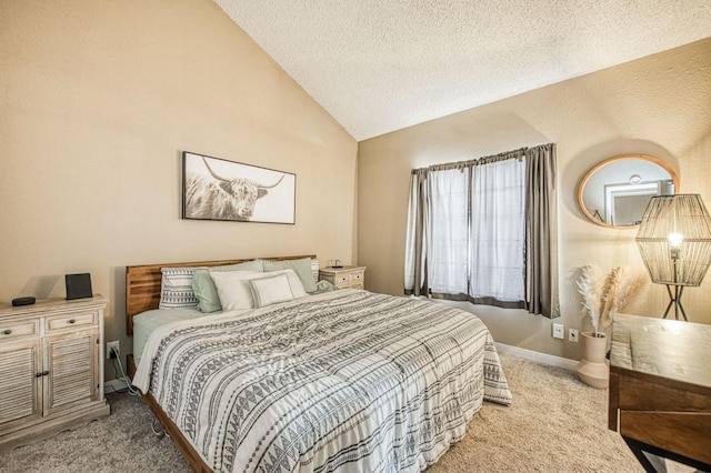 bedroom with carpet flooring, a textured ceiling, baseboards, and vaulted ceiling