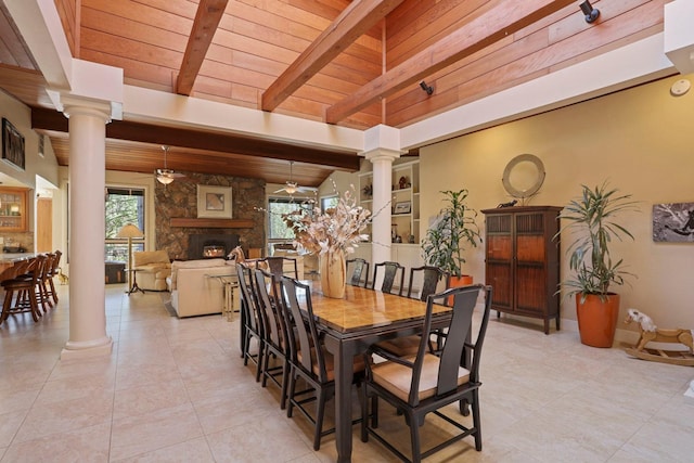 dining room with wood ceiling, decorative columns, and a wealth of natural light