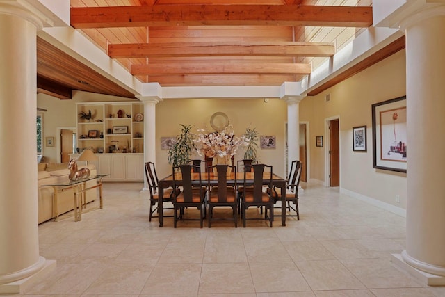 dining space featuring ornate columns, beam ceiling, and wood ceiling