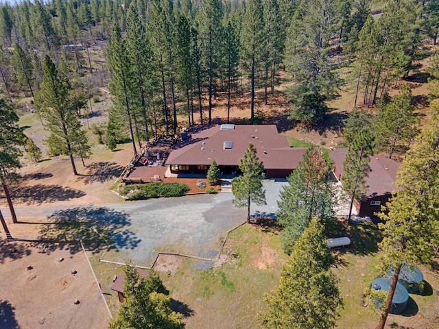 aerial view featuring a forest view