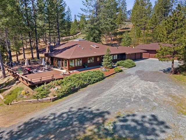 view of front of house with driveway and a garage