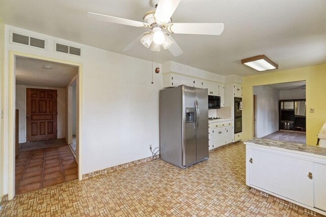 kitchen with a ceiling fan, visible vents, white cabinetry, and black appliances