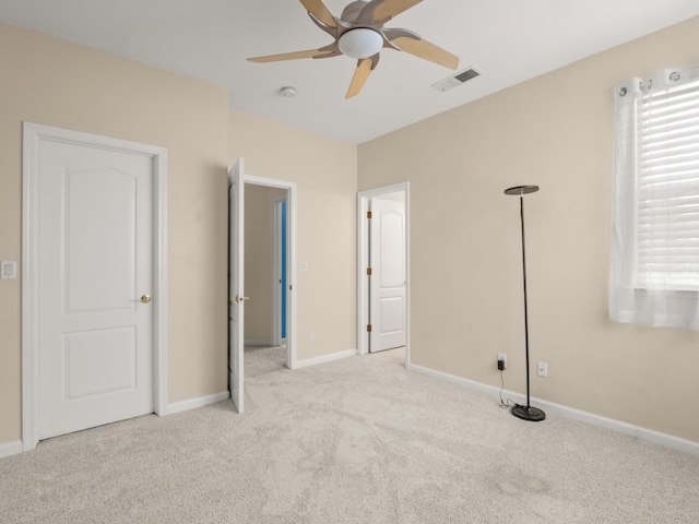9596 N Winery Ave, Fresno, CA 93720 - unfurnished bedroom featuring visible vents, a ceiling fan, carpet, and baseboards