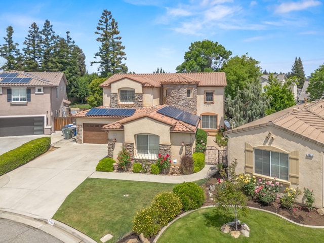 9596 N Winery Ave, Fresno, CA 93720 - mediterranean / spanish house featuring a gate, stucco siding, a tiled roof, and stone siding