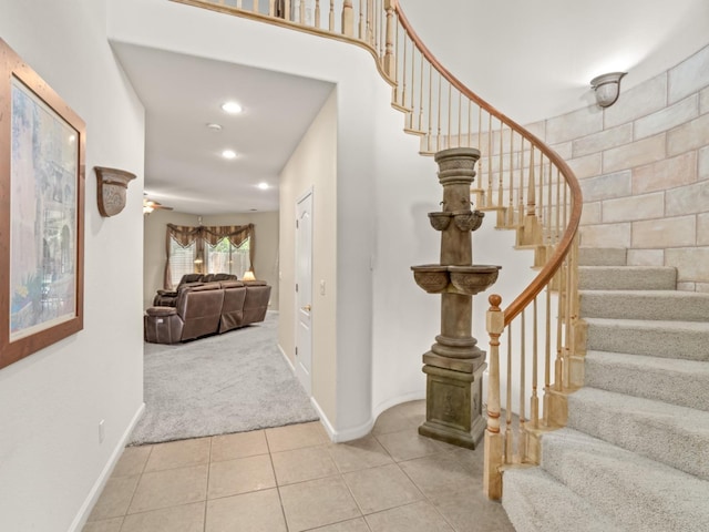 9596 N Winery Ave, Fresno, CA 93720 - staircase featuring tile patterned floors, baseboards, recessed lighting, and carpet floors