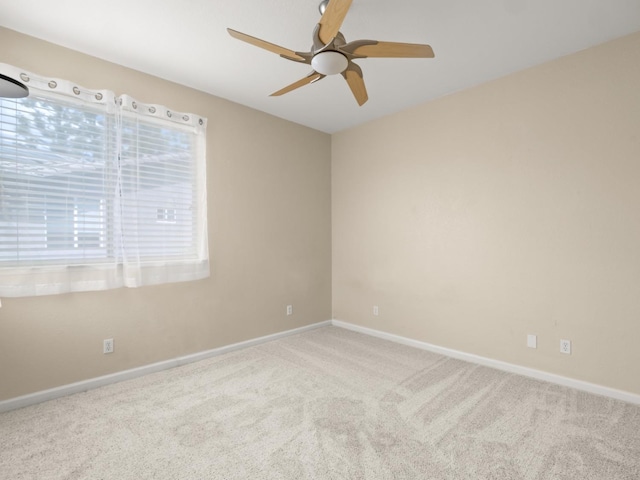 9596 N Winery Ave, Fresno, CA 93720 - empty room with baseboards, ceiling fan, and carpet flooring