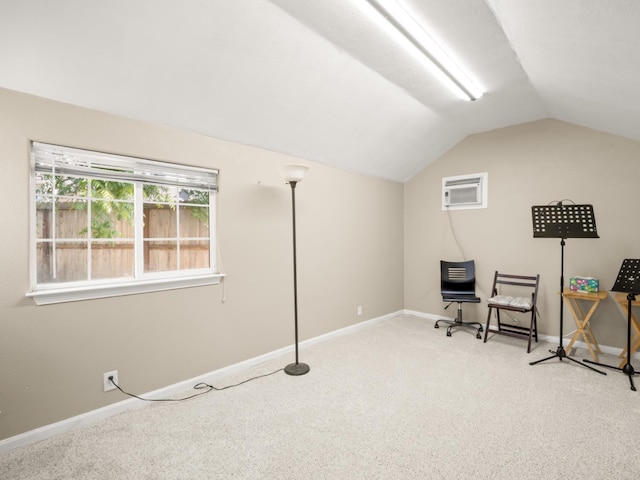 9596 N Winery Ave, Fresno, CA 93720 - interior space with carpet floors, baseboards, a wall mounted air conditioner, and lofted ceiling