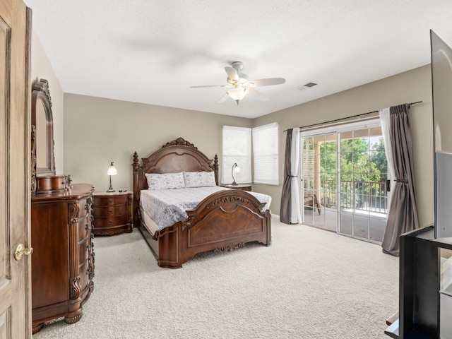 9596 N Winery Ave, Fresno, CA 93720 - bedroom with access to outside, a ceiling fan, visible vents, and light colored carpet