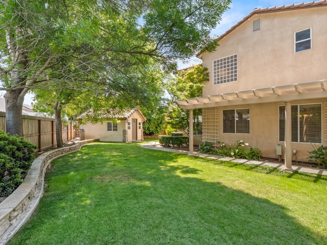 9596 N Winery Ave, Fresno, CA 93720 - view of yard with a pergola, fence, and an outbuilding