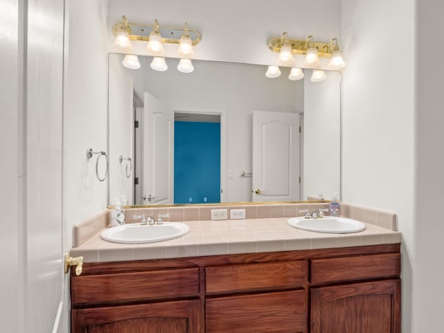 9596 N Winery Ave, Fresno, CA 93720 - full bathroom featuring double vanity and a sink