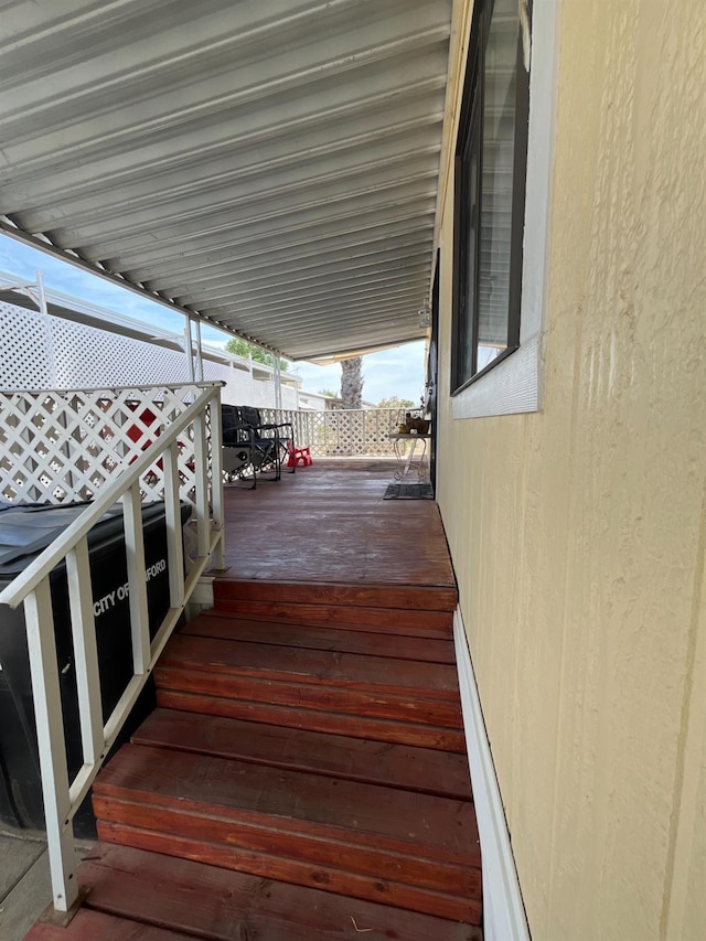 860 E Grangeville Blvd Unit 153, Hanford, CA 93230 - wooden terrace featuring outdoor dining area