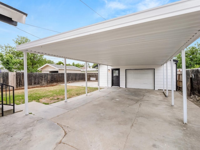 garage with fence
