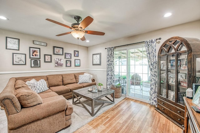 living area featuring recessed lighting, ceiling fan, and light wood-type flooring