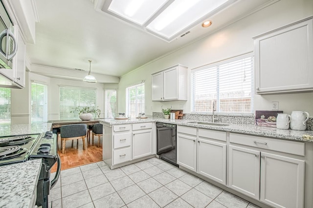 kitchen with electric range, a sink, a peninsula, ornamental molding, and black dishwasher