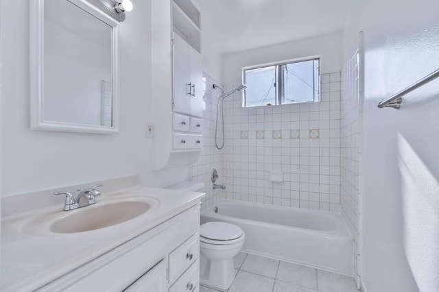 full bathroom with vanity, tile patterned floors, toilet, and shower / washtub combination