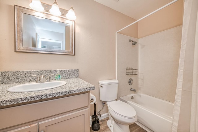 bathroom featuring toilet, shower / bathtub combination with curtain, and vanity
