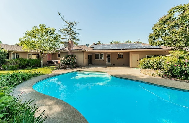pool featuring a patio area