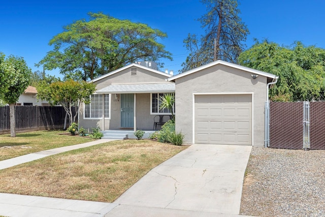 ranch-style home featuring fence, covered porch, stucco siding, and a front lawn